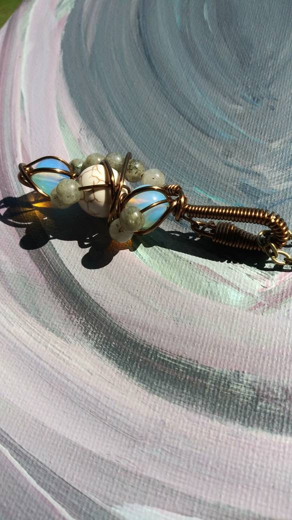 Mad Images. Opalite, howlite and labradorite necklace. Made by Eyesthatburnthemind.