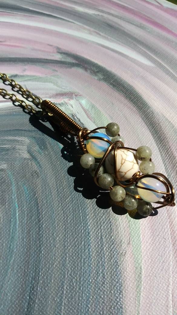 Mad Images. Opalite, howlite and labradorite necklace. Made by Eyesthatburnthemind.