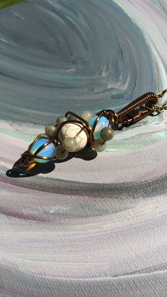 Mad Images. Opalite, howlite and labradorite necklace. Made by Eyesthatburnthemind.