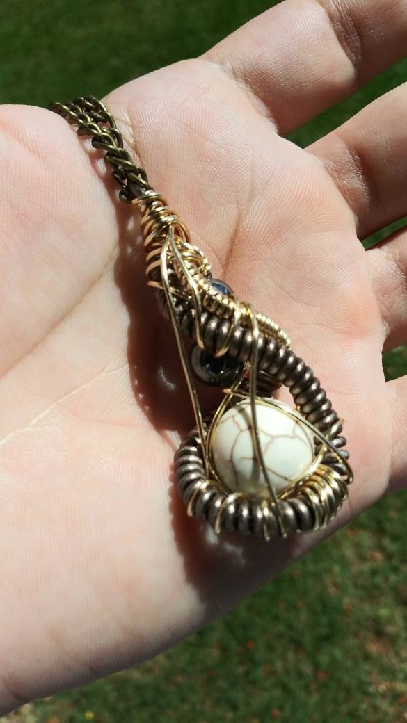 Darkness. Howlite and hematite necklace. Made by Eyesthatburnthemind.