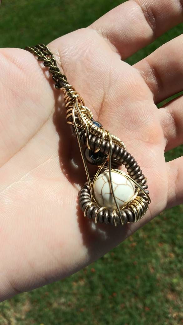 Darkness. Howlite and hematite necklace. Made by Eyesthatburnthemind.