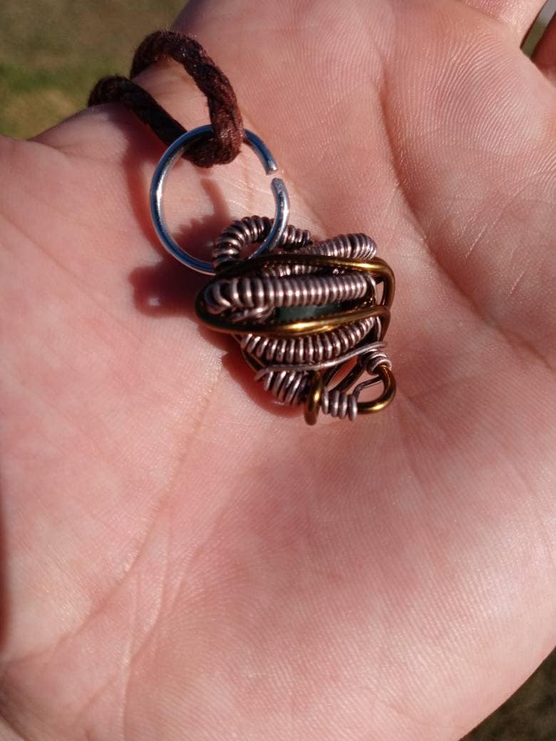 Nebulous. Cats Eye glass necklace. Made by Eyesthatburnthemind.