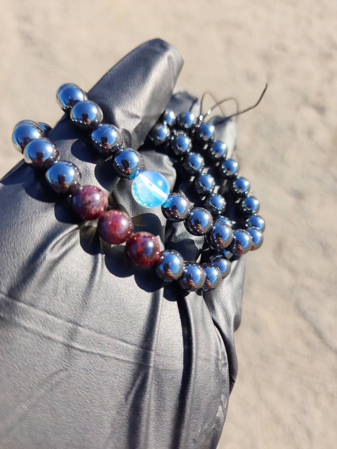 Mo·ral·i·ty. Pair of Hematite/ Opalite and Garnet bracelets. Your choice of size. Made by Eyesthatburnthemind.