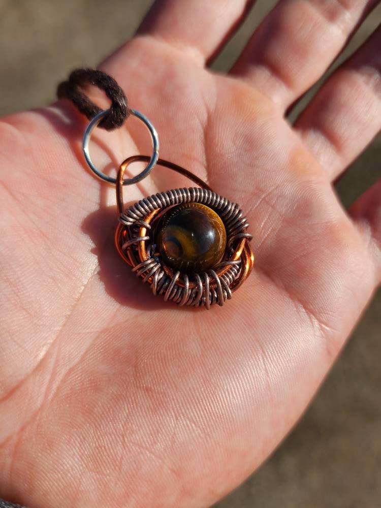 Primordial Vision. Golden Tigers Eye necklace. Made by Eyesthatburnthemind.