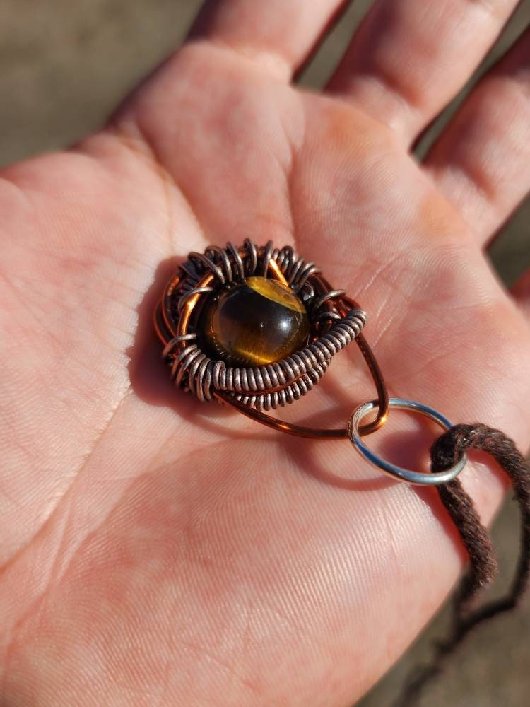 Primordial Vision. Golden Tigers Eye necklace. Made by Eyesthatburnthemind.