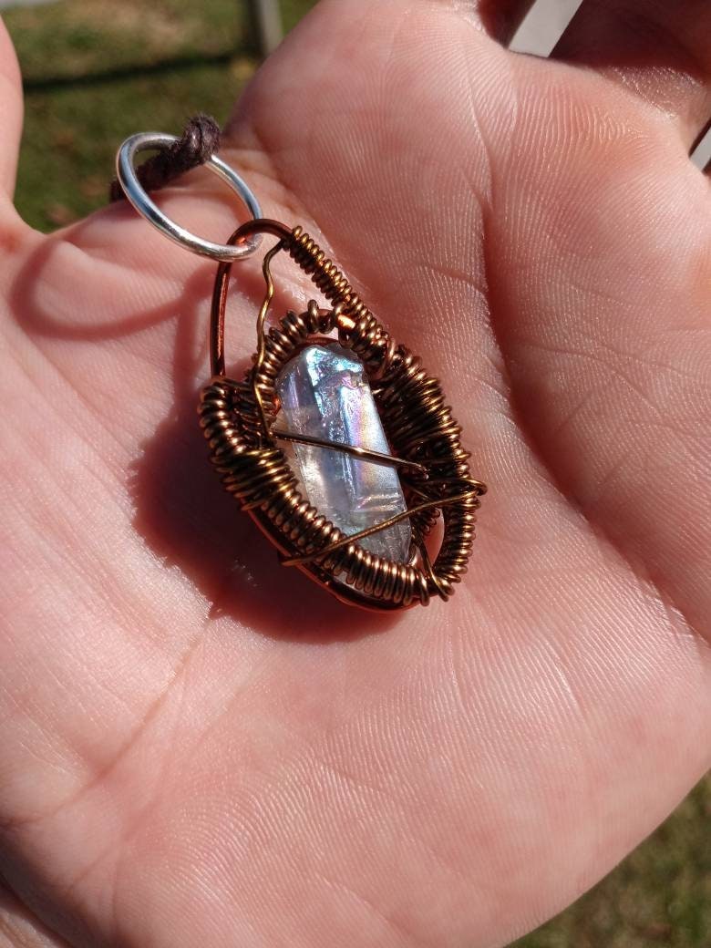Buffed Shield. Flashed Quartz and copper necklace. Made by Eyesthatburnthemind.