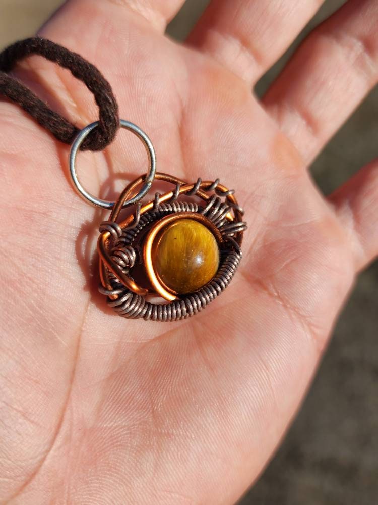 Primordial Vision. Golden Tigers Eye necklace. Made by Eyesthatburnthemind.