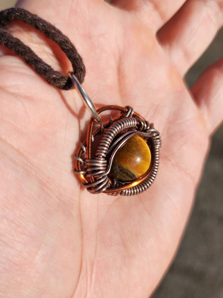 Primordial Vision. Golden Tigers Eye necklace. Made by Eyesthatburnthemind.