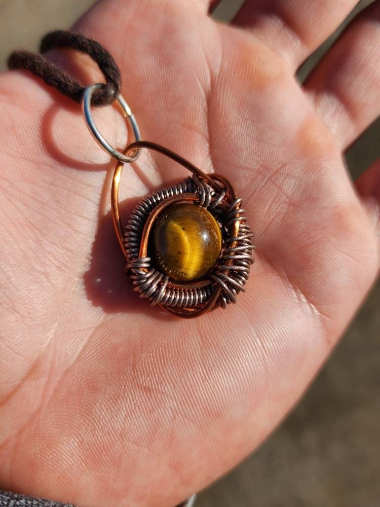 Primordial Vision. Golden Tigers Eye necklace. Made by Eyesthatburnthemind.