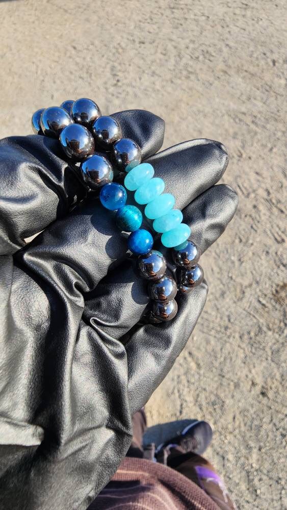 Cooling Down. Pair of Hematite/ Blue Tigers Eye and Blue Jade bracelets. Your choice of size. Made by Eyesthatburnthemind.