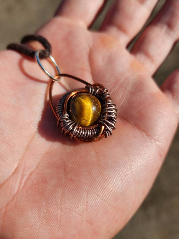Primordial Vision. Golden Tigers Eye necklace. Made by Eyesthatburnthemind.