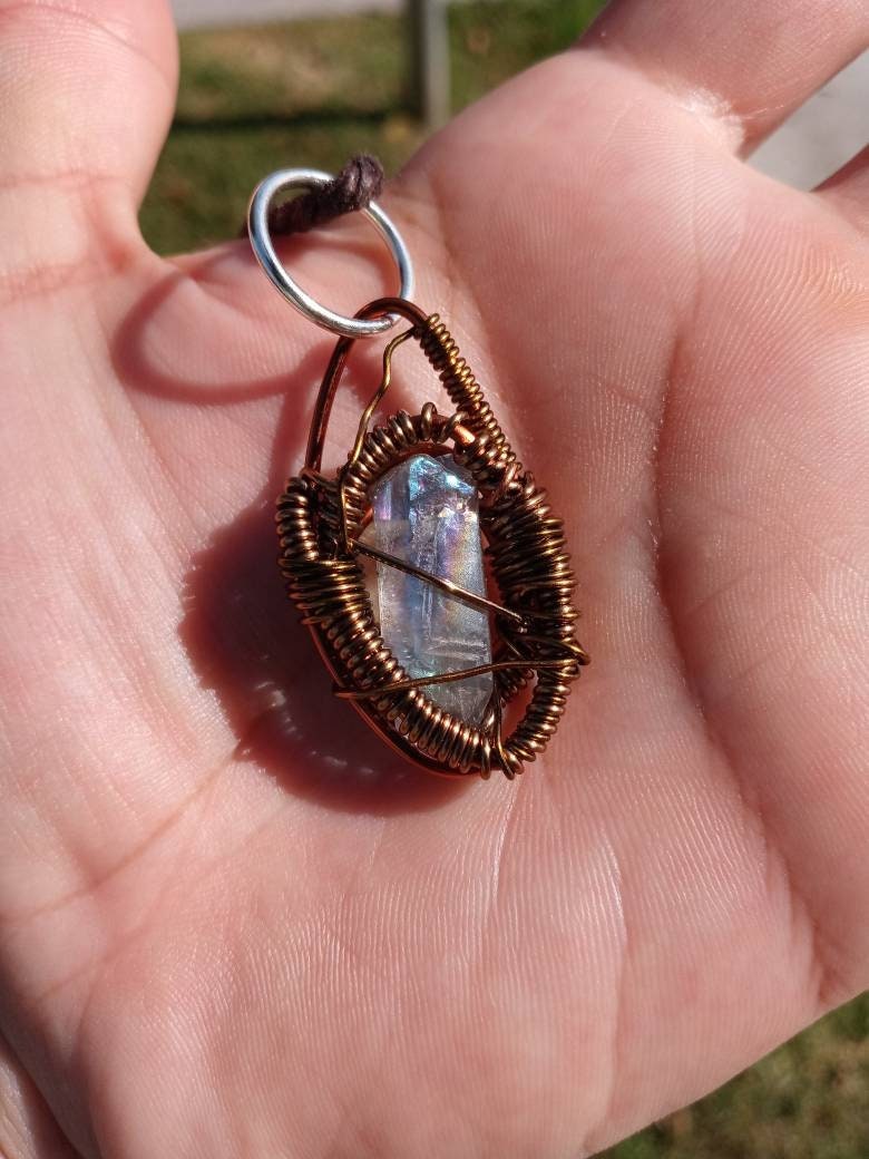 Buffed Shield. Flashed Quartz and copper necklace. Made by Eyesthatburnthemind.