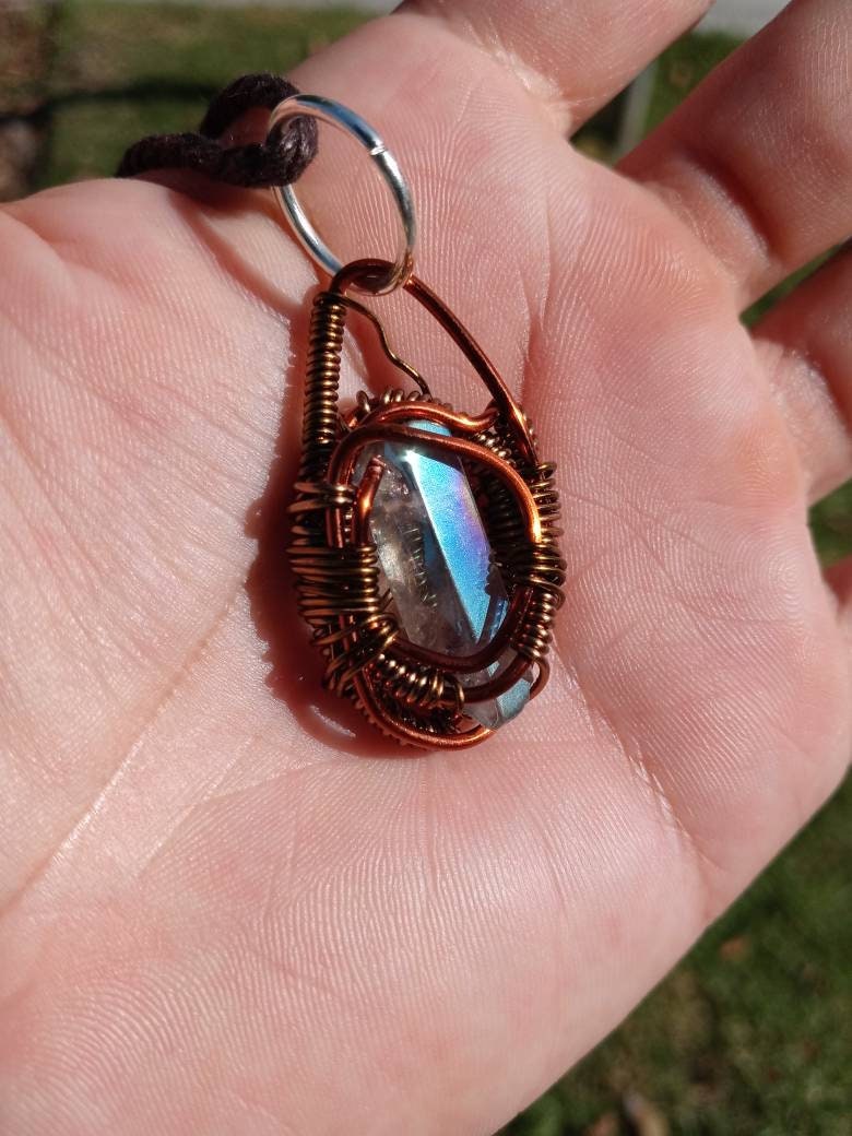 Buffed Shield. Flashed Quartz and copper necklace. Made by Eyesthatburnthemind.