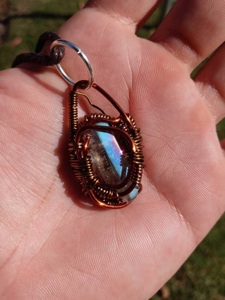 Buffed Shield. Flashed Quartz and copper necklace. Made by Eyesthatburnthemind.