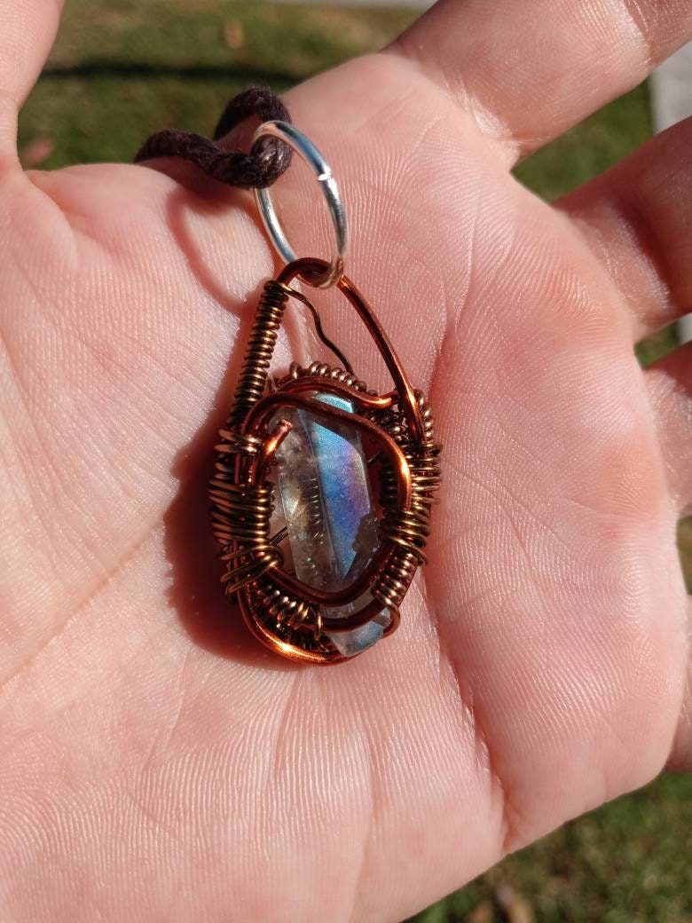Buffed Shield. Flashed Quartz and copper necklace. Made by Eyesthatburnthemind.