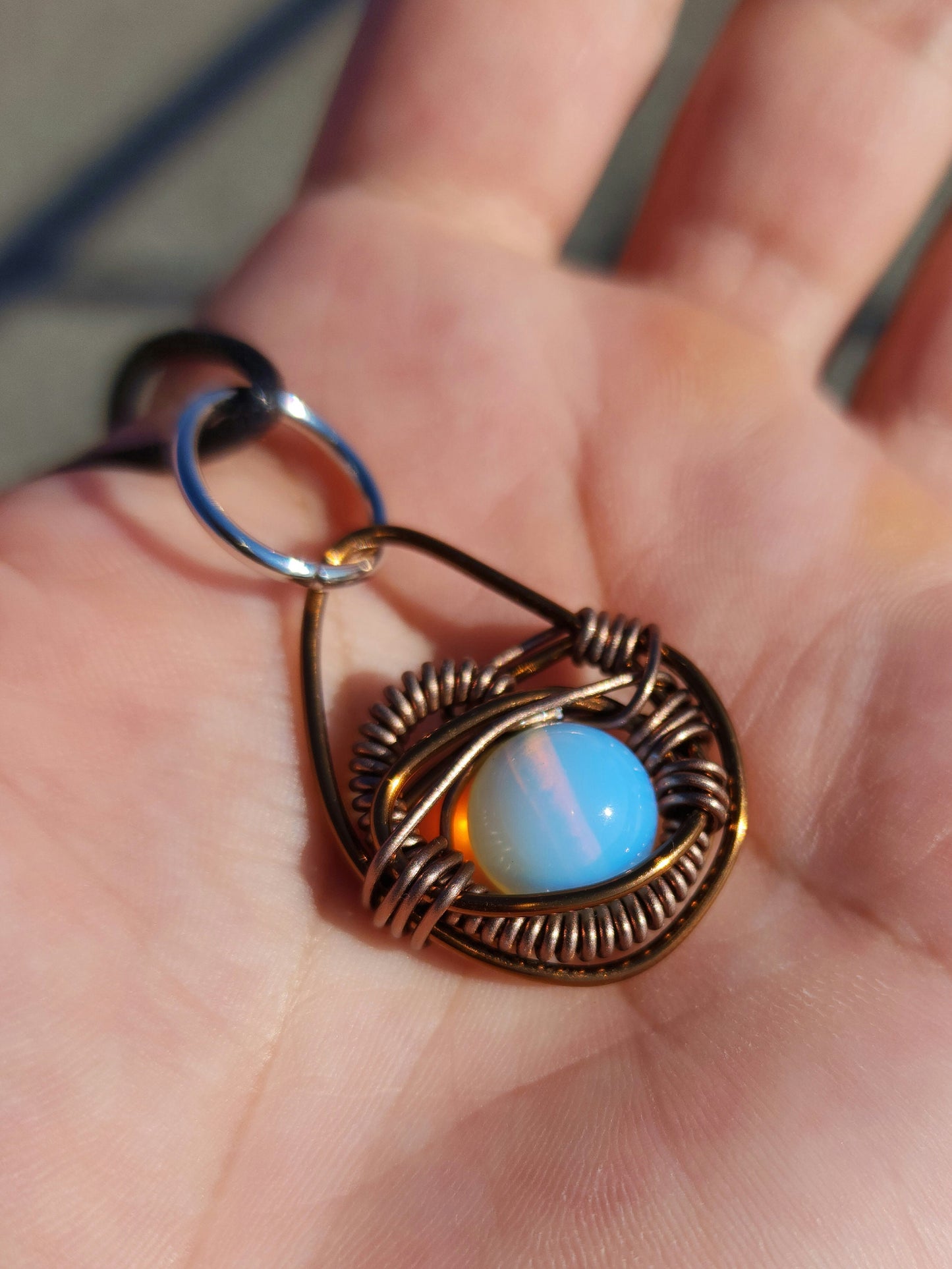 Eye of A Serpent. Opalite necklace. Made by Eyesthatburnthemind