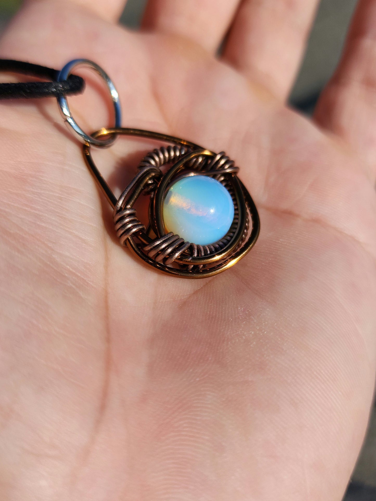 Eye of A Serpent. Opalite necklace. Made by Eyesthatburnthemind