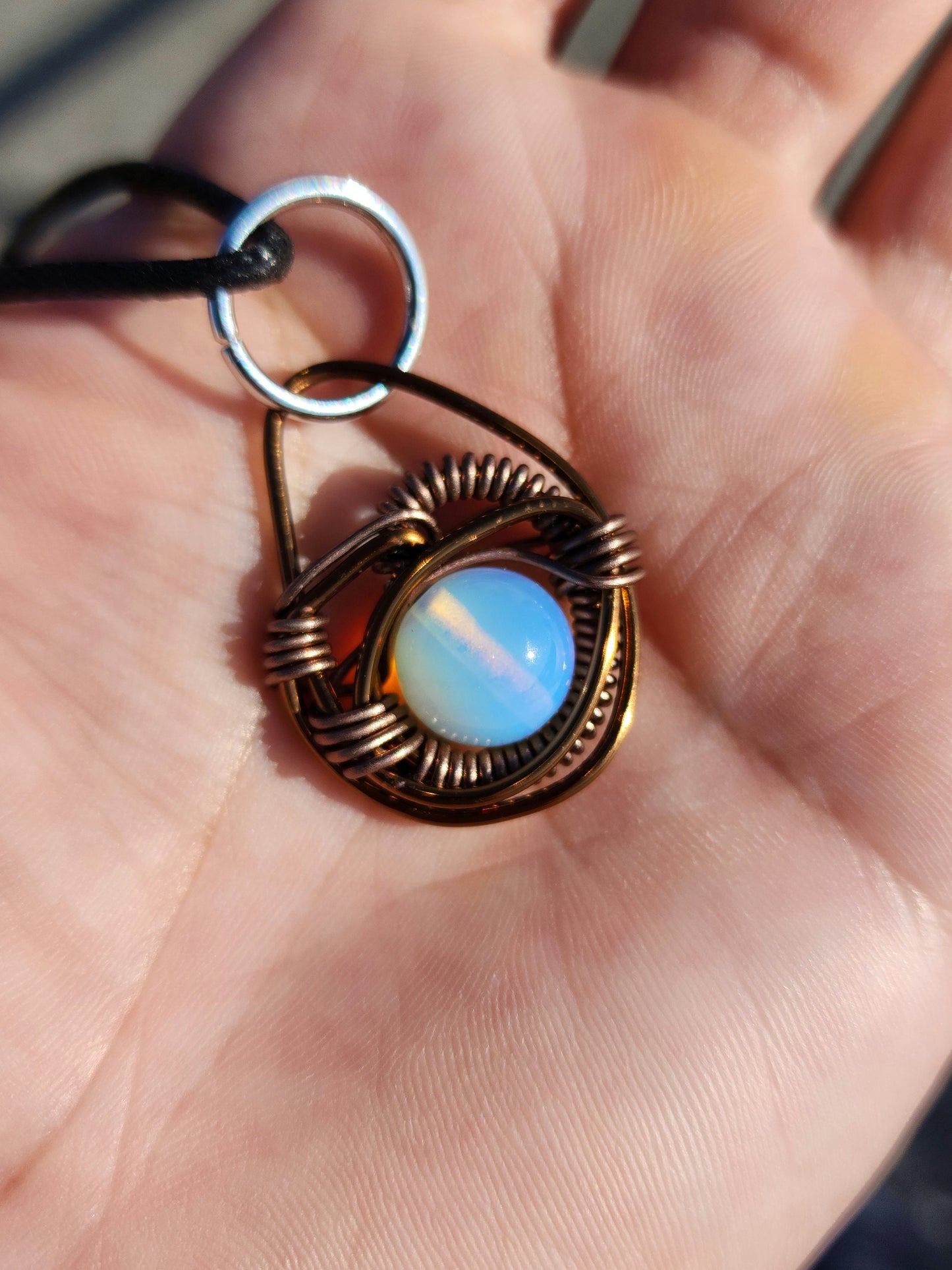 Eye of A Serpent. Opalite necklace. Made by Eyesthatburnthemind