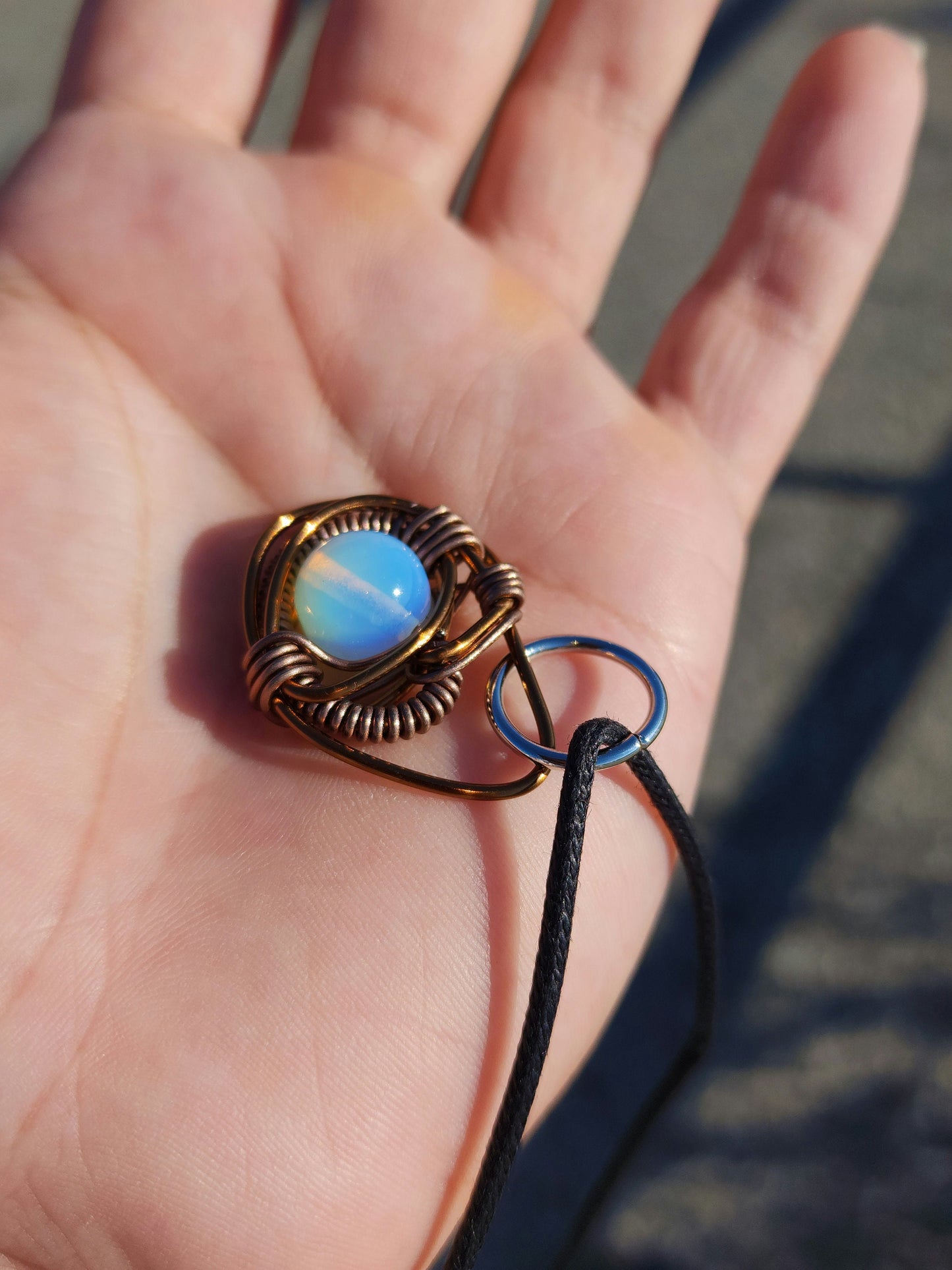 Eye of A Serpent. Opalite necklace. Made by Eyesthatburnthemind