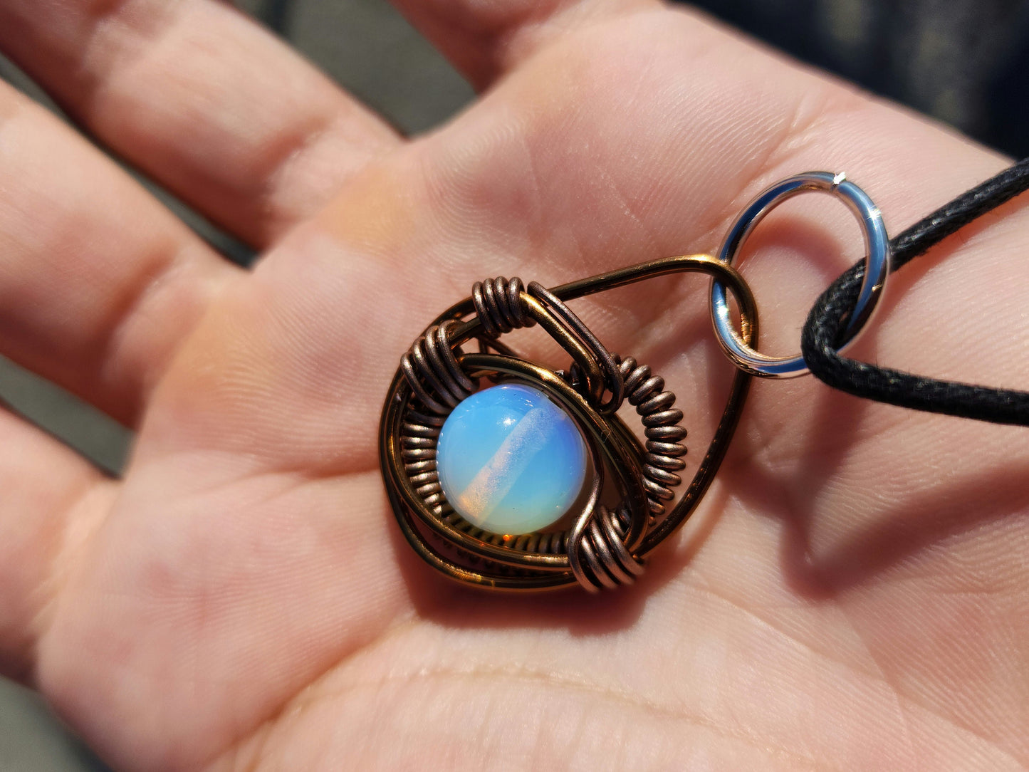 Eye of A Serpent. Opalite necklace. Made by Eyesthatburnthemind