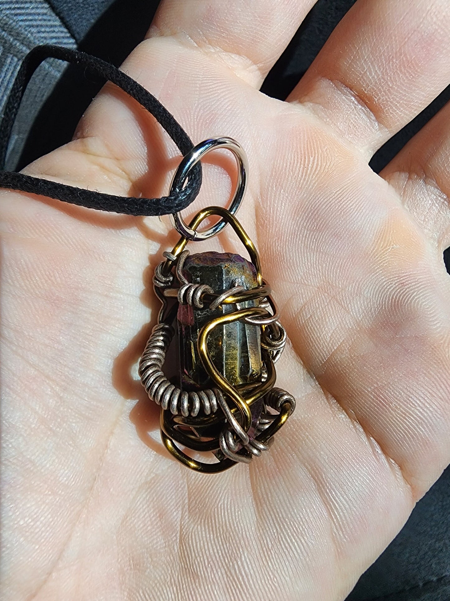 Ancient Contraption. Flashed quartz crystal necklace. Made by Eyesthatburnthemind.