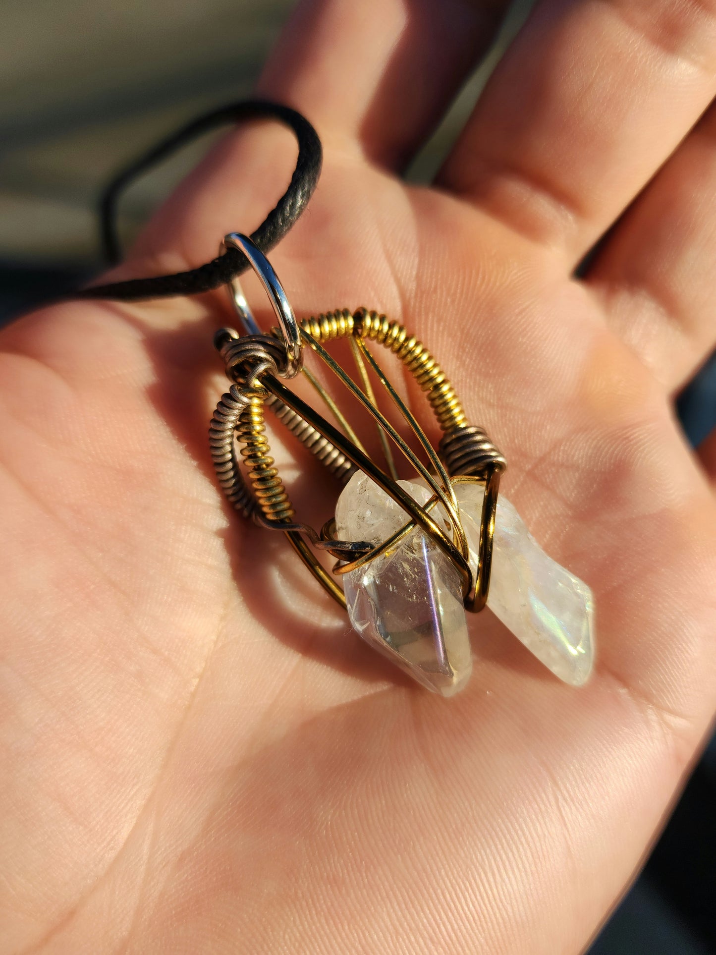 Twin Beings. Flashed Quartz crystal necklace. Made by Eyesthatburnthemind.