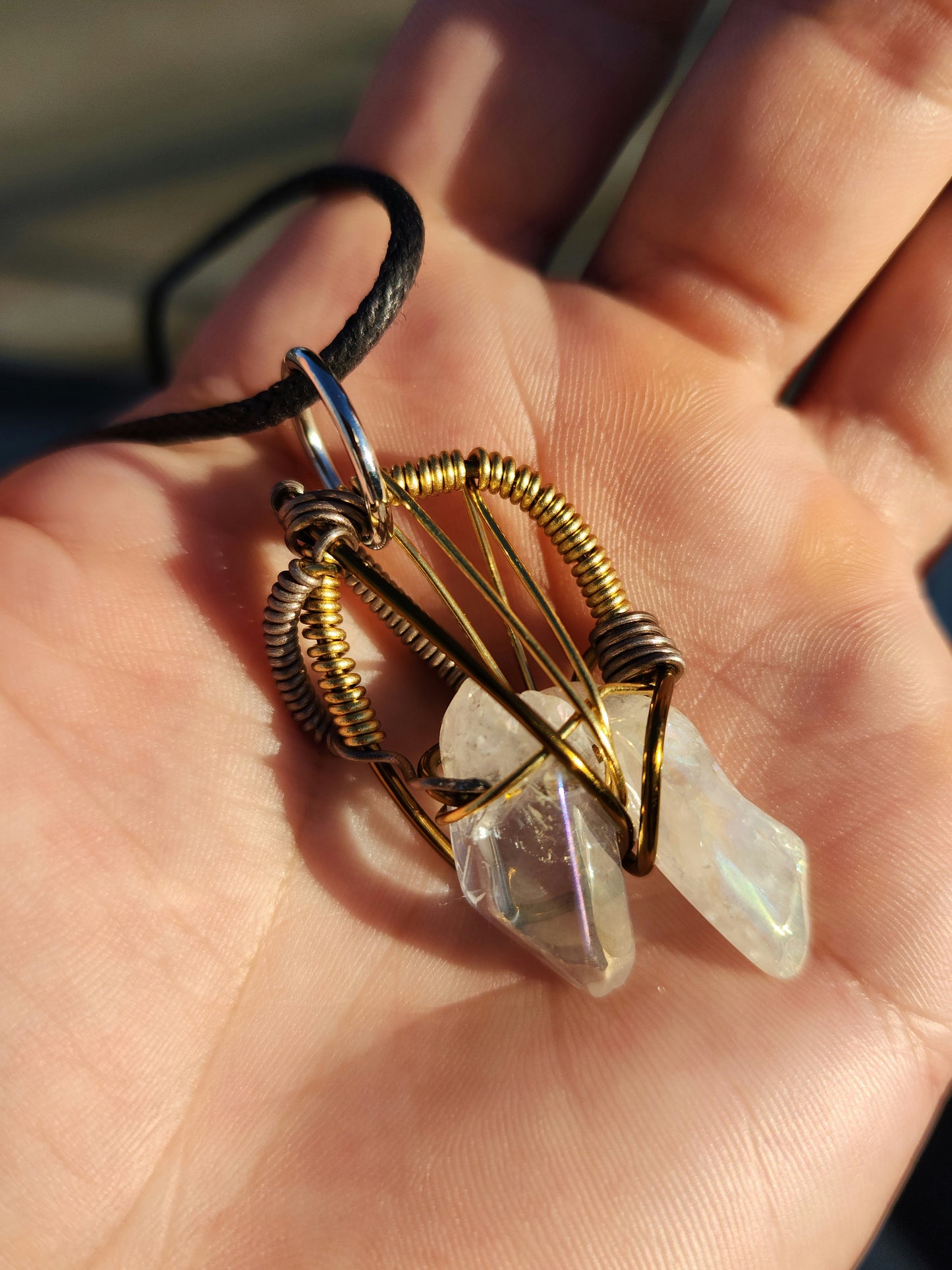 Twin Beings. Flashed Quartz crystal necklace. Made by Eyesthatburnthemind.