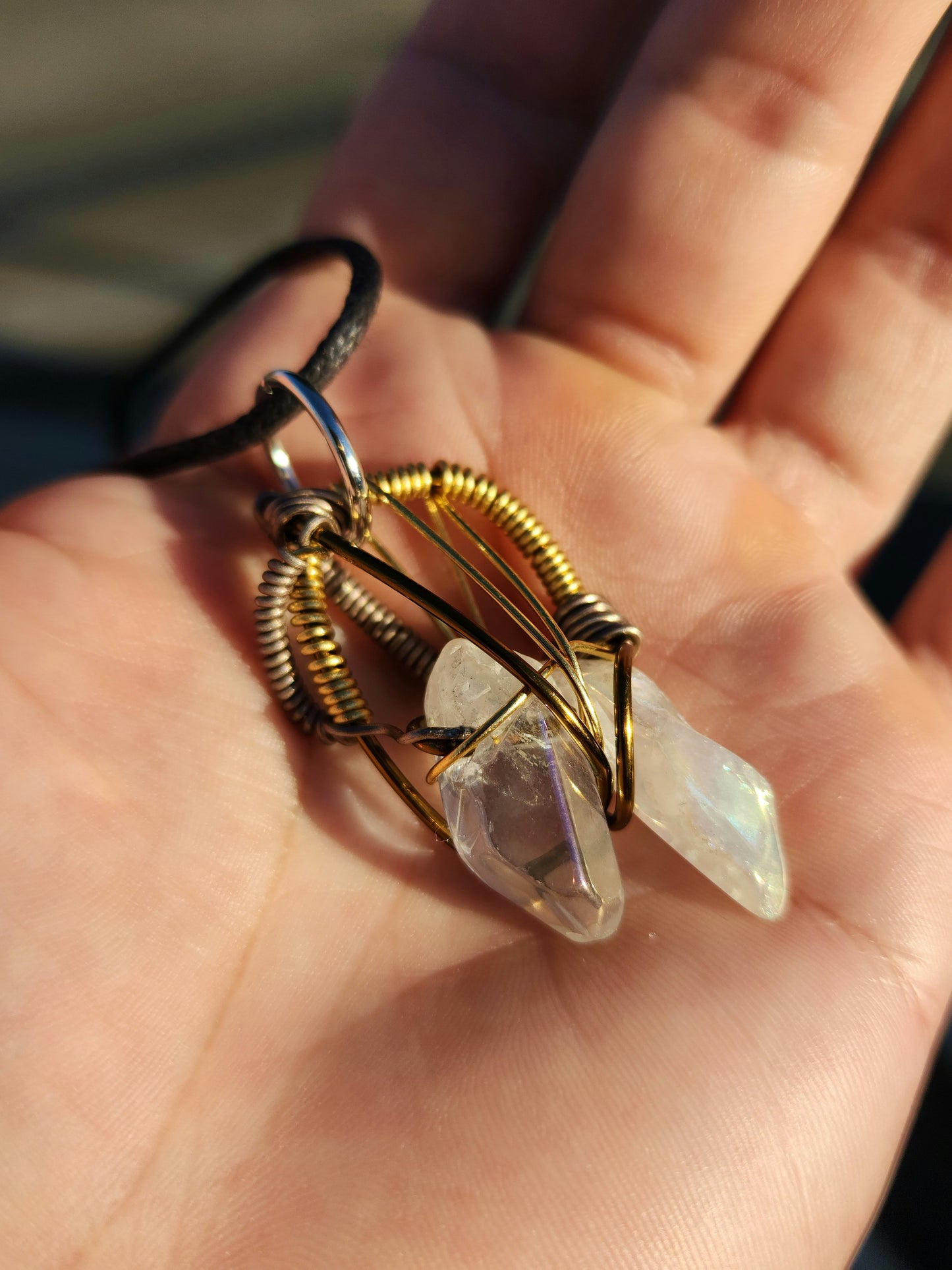 Twin Beings. Flashed Quartz crystal necklace. Made by Eyesthatburnthemind.