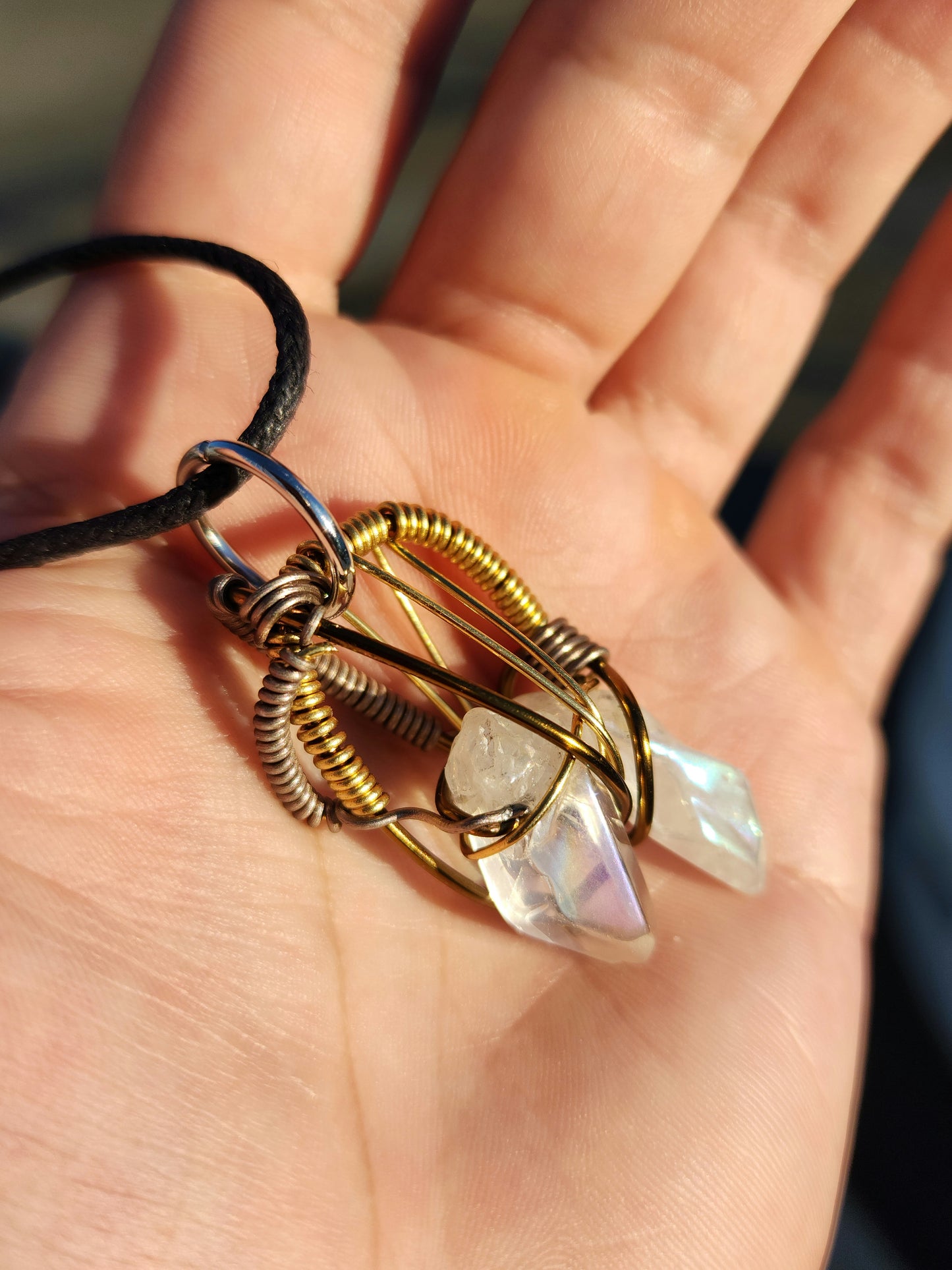 Twin Beings. Flashed Quartz crystal necklace. Made by Eyesthatburnthemind.