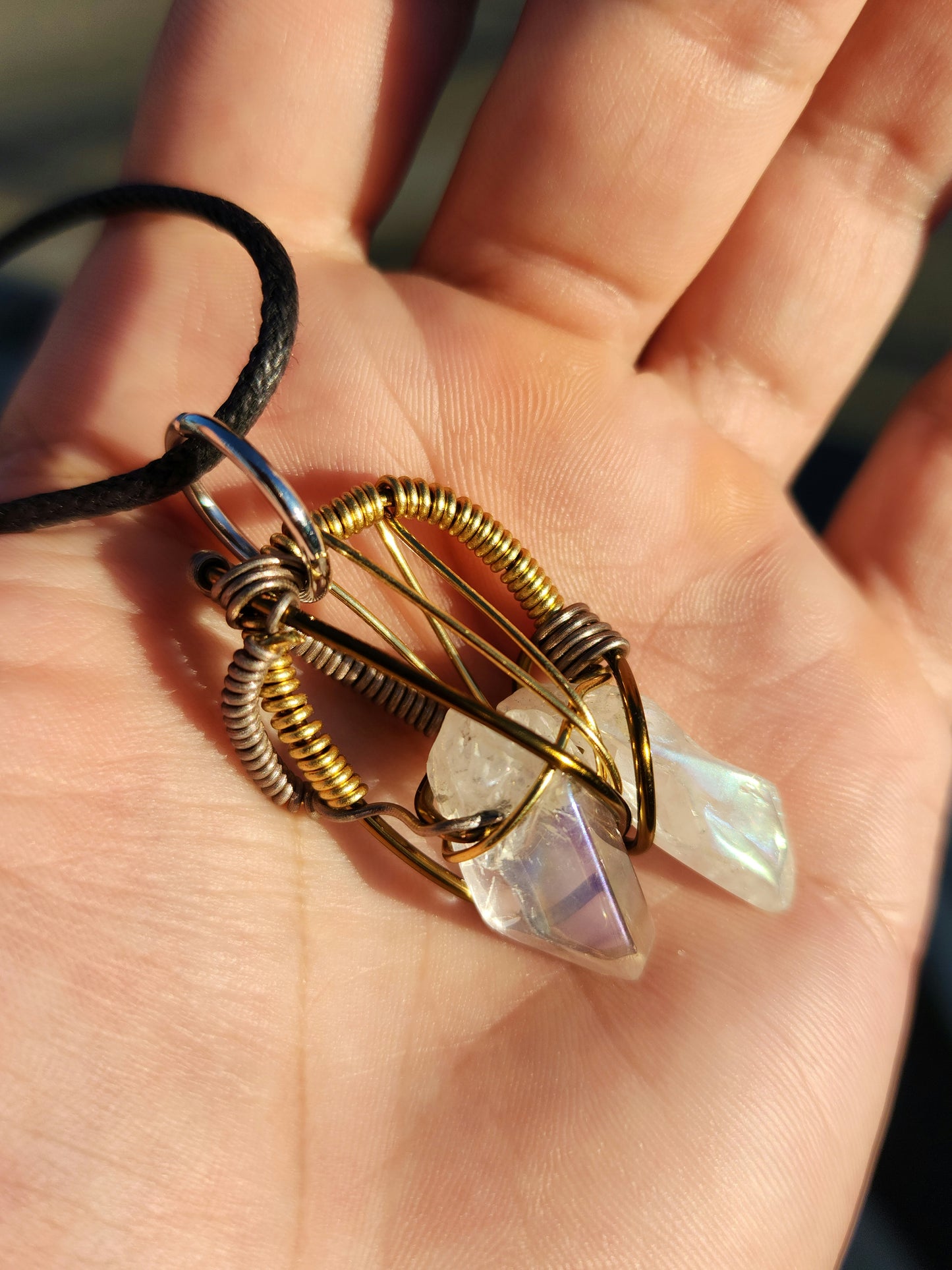 Twin Beings. Flashed Quartz crystal necklace. Made by Eyesthatburnthemind.