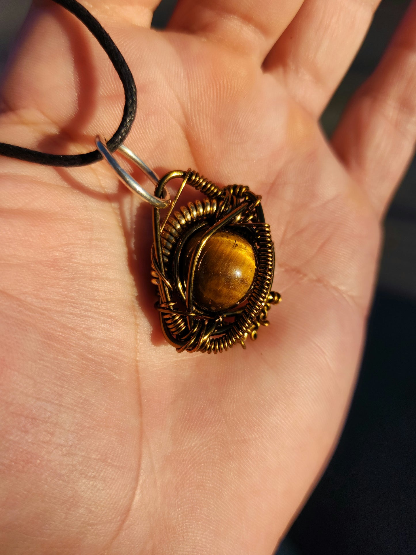 Primordial Vision. Golden Tigers necklace. Made by Eyesthatburnthemind.