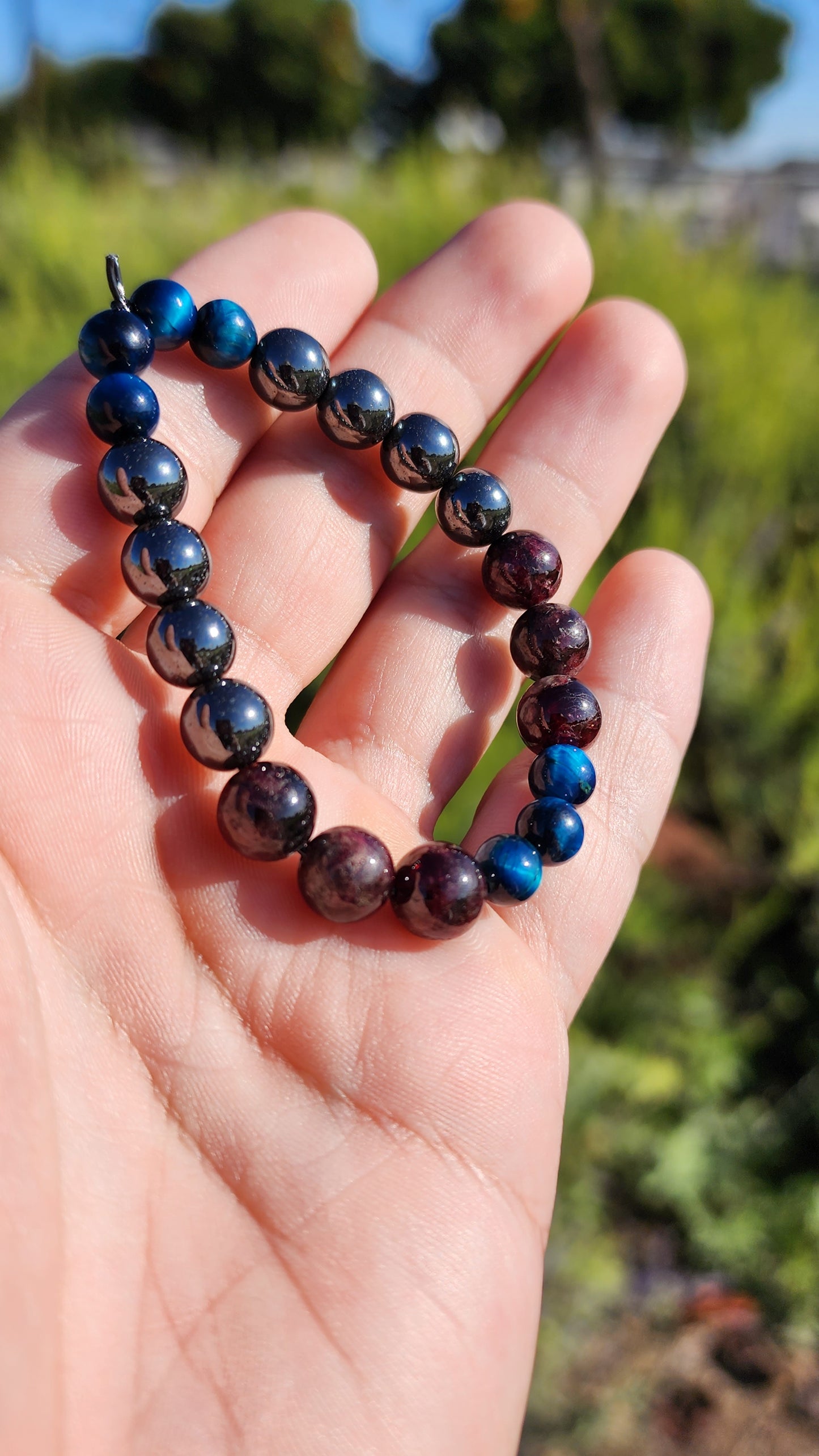 Primary Textures. Hematite, Garnet and Blue Tigers Eye Crystal Bracelet. Made by Eyesthatburnthemind.