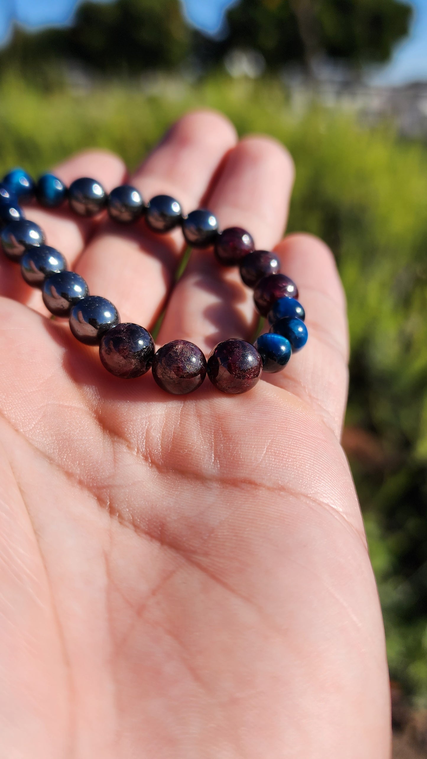 Primary Textures. Hematite, Garnet and Blue Tigers Eye Crystal Bracelet. Made by Eyesthatburnthemind.