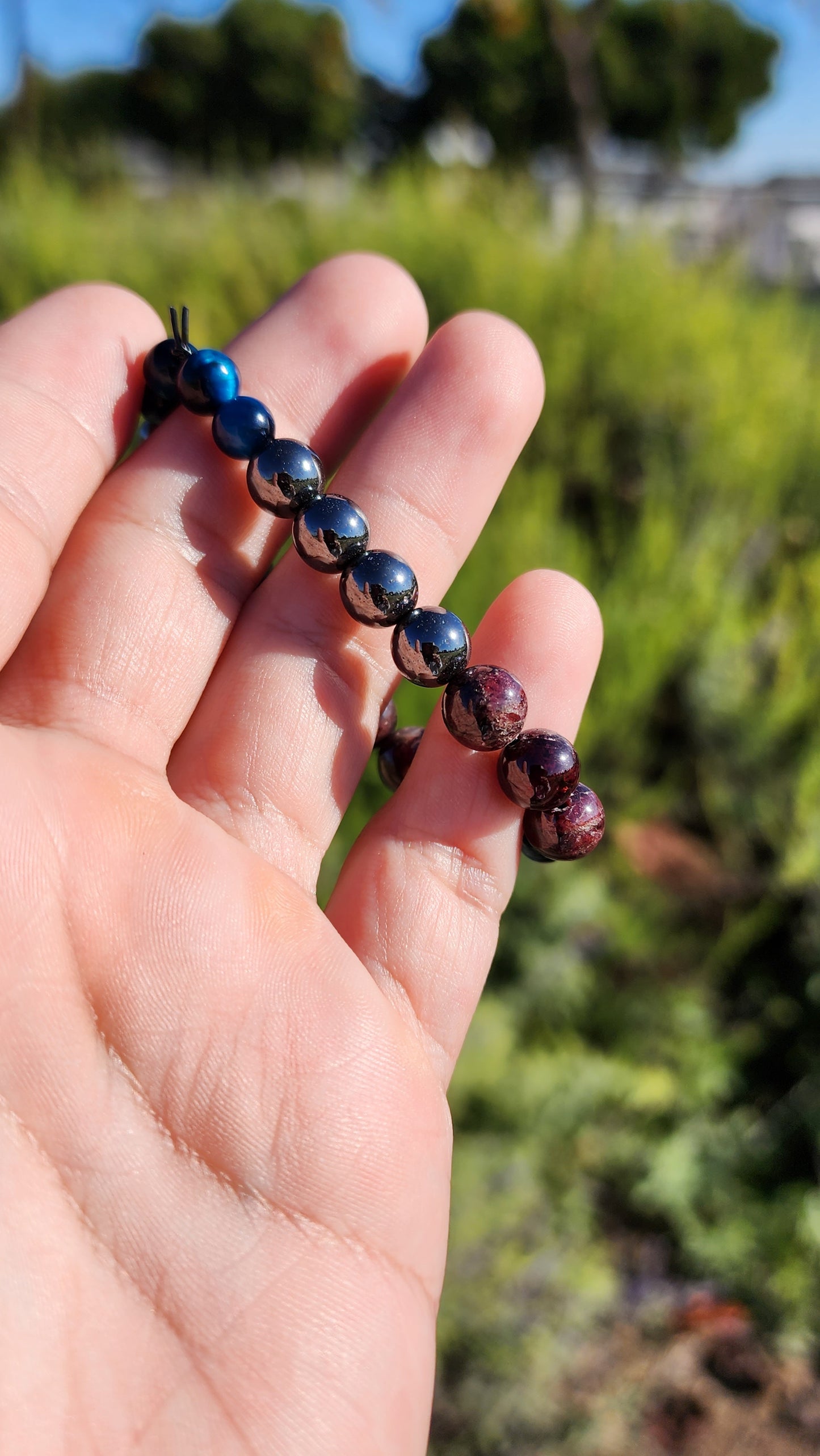 Primary Textures. Hematite, Garnet and Blue Tigers Eye Crystal Bracelet. Made by Eyesthatburnthemind.