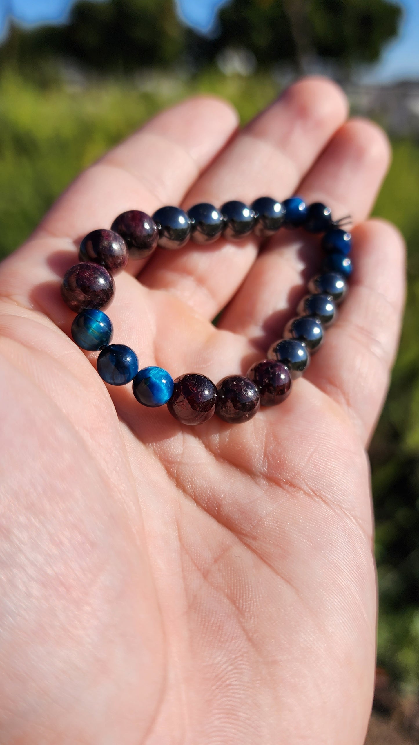 Primary Textures. Hematite, Garnet and Blue Tigers Eye Crystal Bracelet. Made by Eyesthatburnthemind.