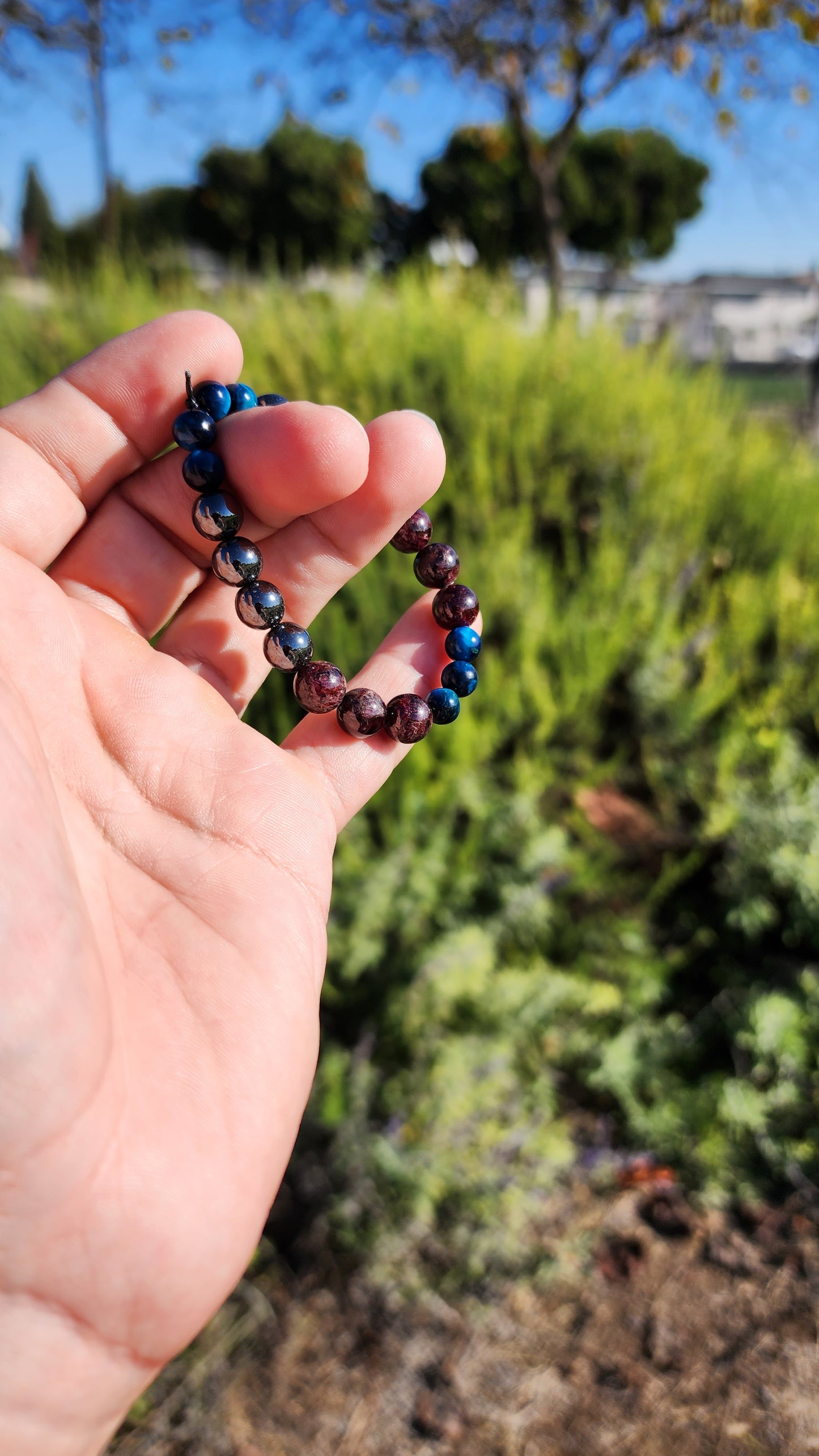 Primary Textures. Hematite, Garnet and Blue Tigers Eye Crystal Bracelet. Made by Eyesthatburnthemind.