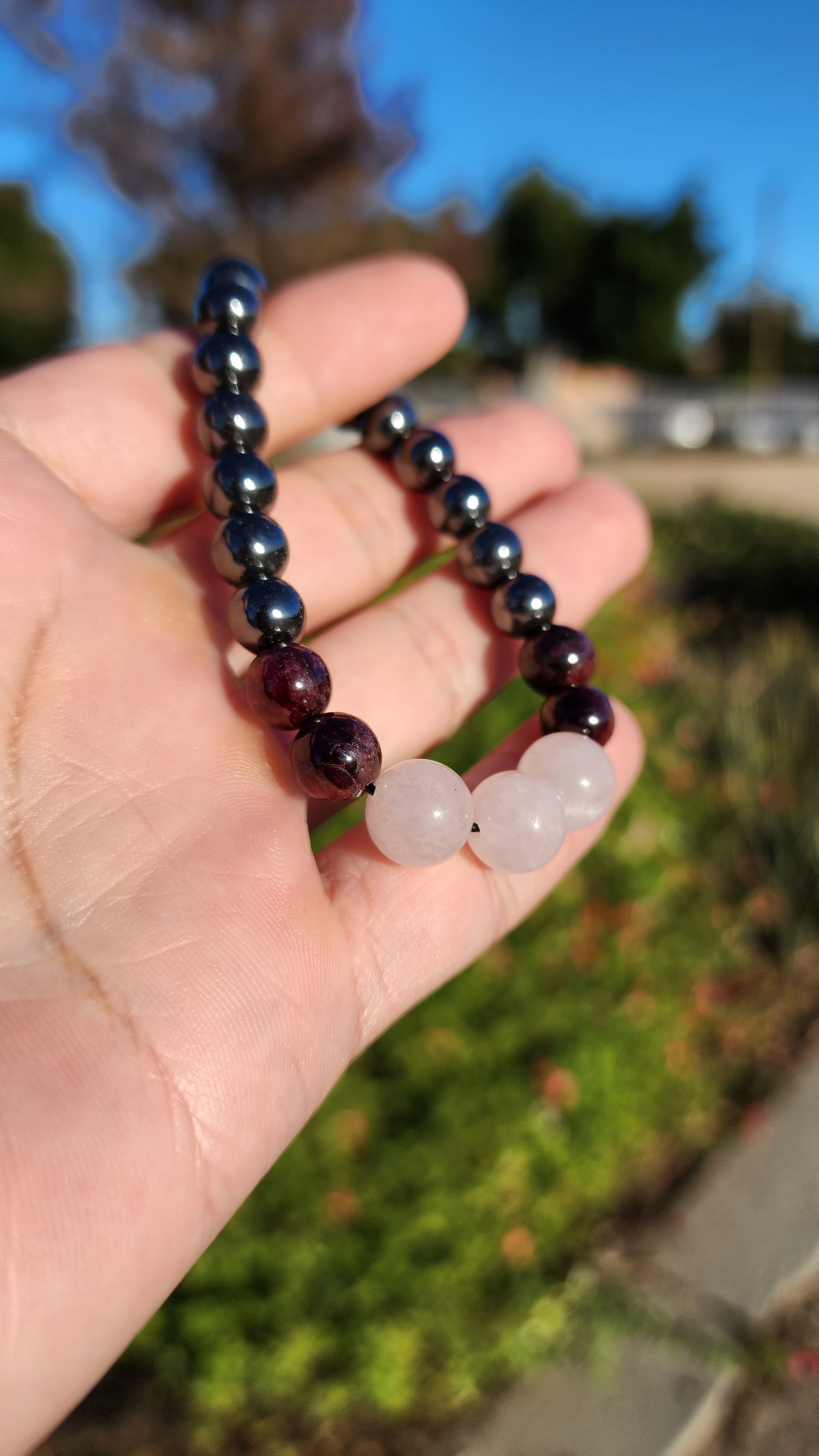 Love and Destruction. Rose Quartz, Garnet and Hematite bracelet. Made by Eyesthatburnthemind.