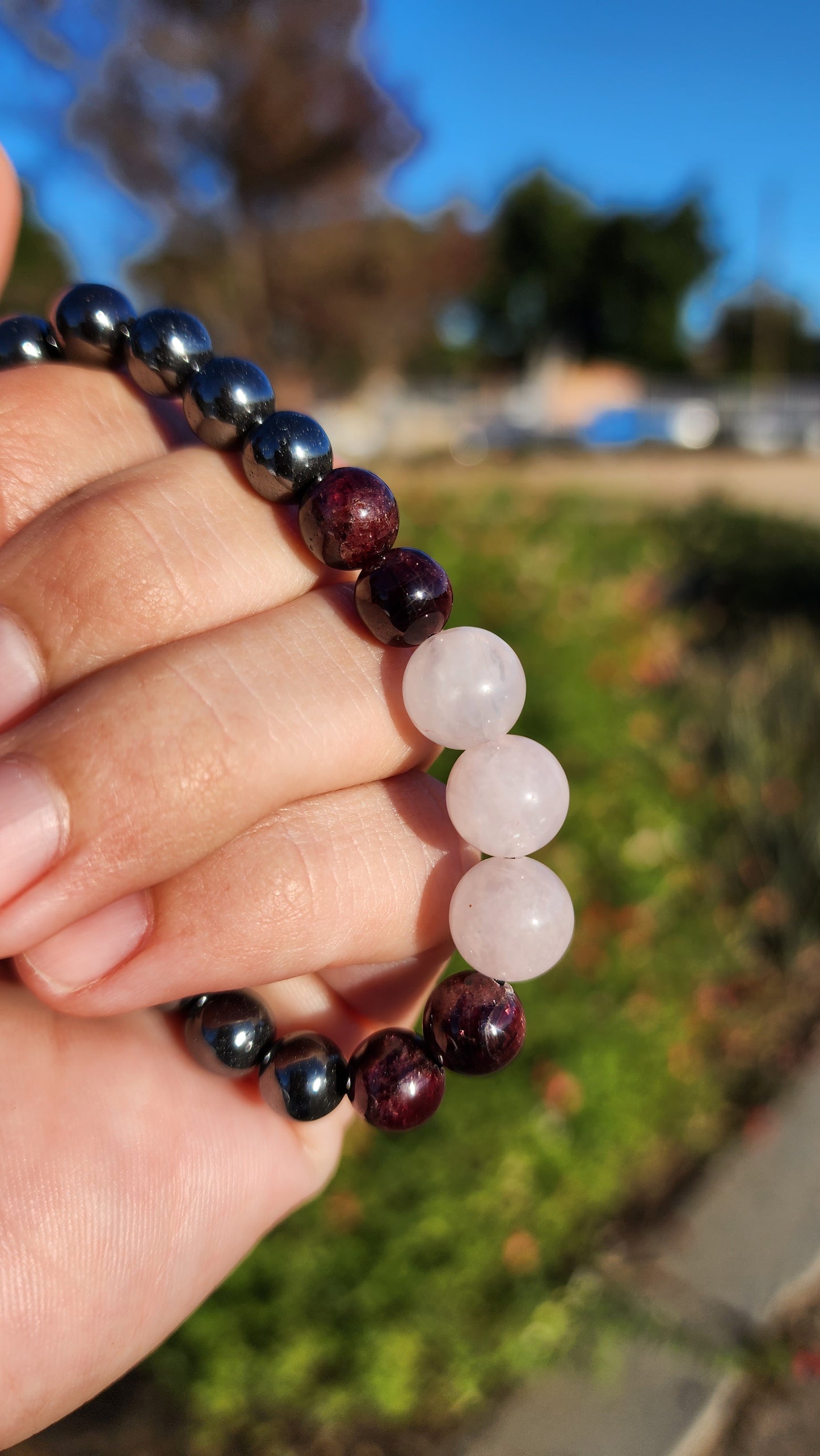 Love and Destruction. Rose Quartz, Garnet and Hematite bracelet. Made by Eyesthatburnthemind.