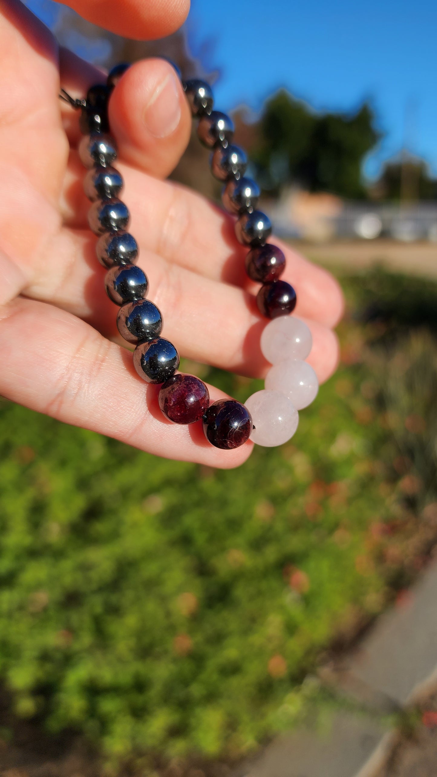 Love and Destruction. Rose Quartz, Garnet and Hematite bracelet. Made by Eyesthatburnthemind.