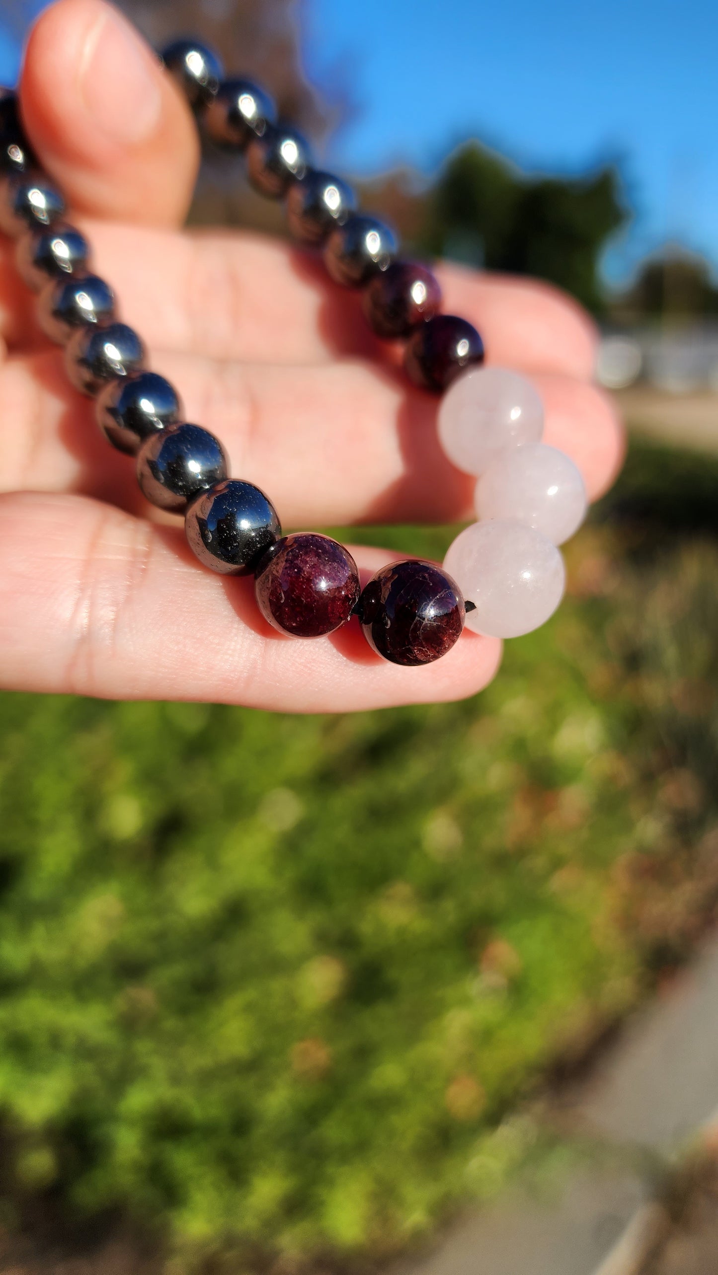 Love and Destruction. Rose Quartz, Garnet and Hematite bracelet. Made by Eyesthatburnthemind.