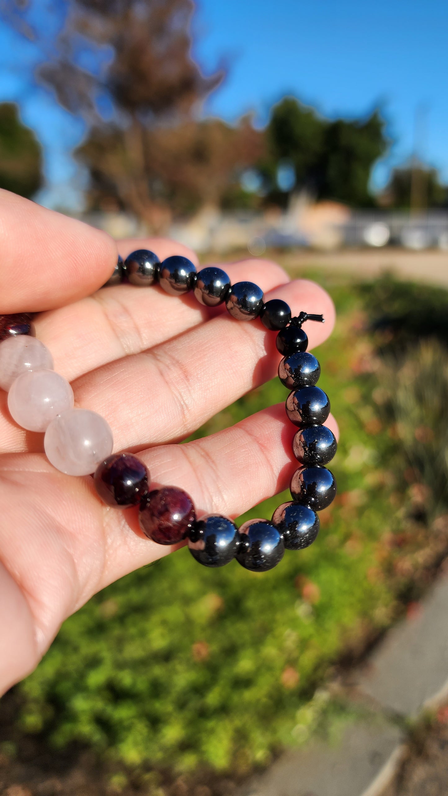 Love and Destruction. Rose Quartz, Garnet and Hematite bracelet. Made by Eyesthatburnthemind.