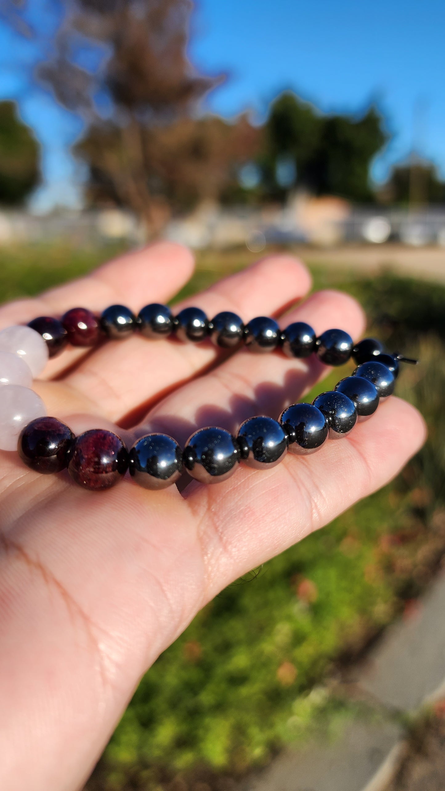 Love and Destruction. Rose Quartz, Garnet and Hematite bracelet. Made by Eyesthatburnthemind.