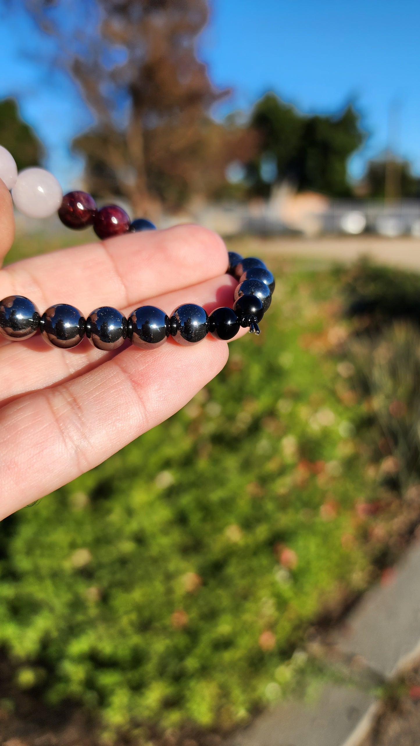 Love and Destruction. Rose Quartz, Garnet and Hematite bracelet. Made by Eyesthatburnthemind.