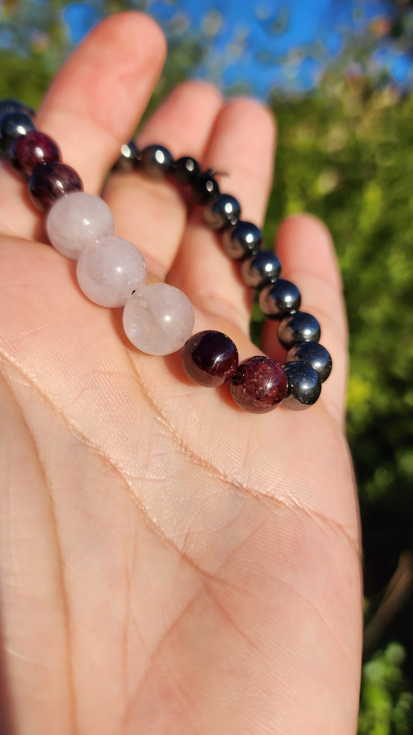 Love and Destruction. Rose Quartz, Garnet and Hematite bracelet. Made by Eyesthatburnthemind.