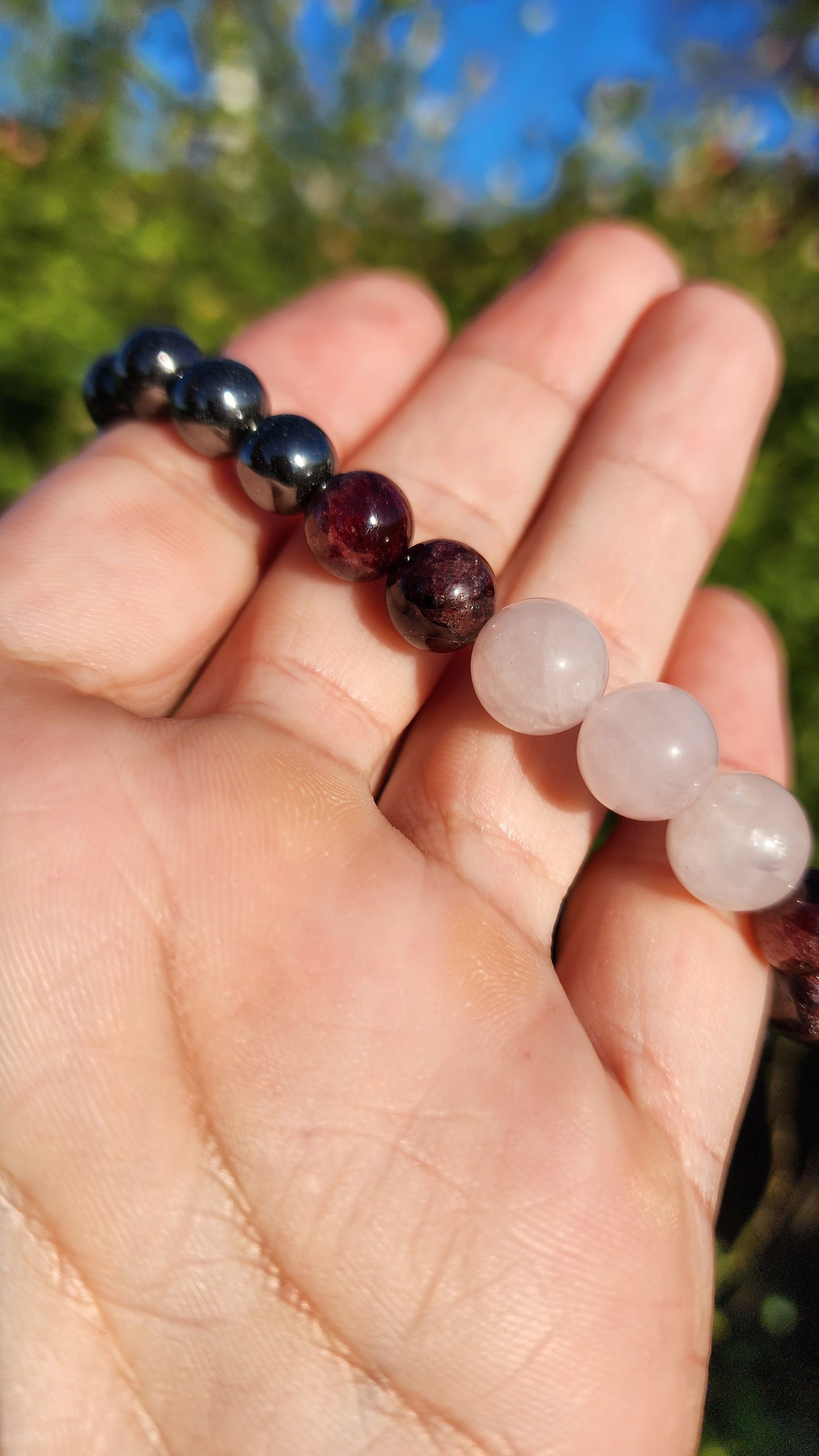 Love and Destruction. Rose Quartz, Garnet and Hematite bracelet. Made by Eyesthatburnthemind.