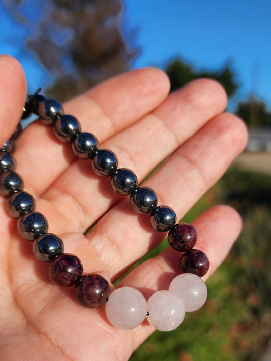 Love and Destruction. Rose Quartz, Garnet and Hematite bracelet. Made by Eyesthatburnthemind.