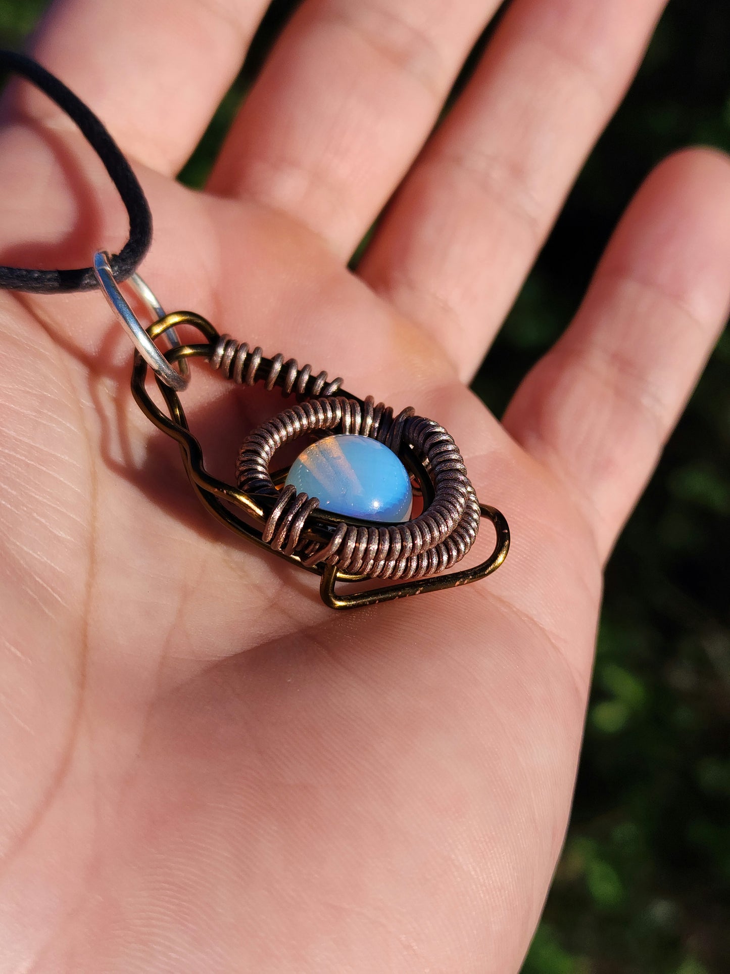 Eye of a Serpent. Opalite necklace. Made by Eyesthatburnthemind.