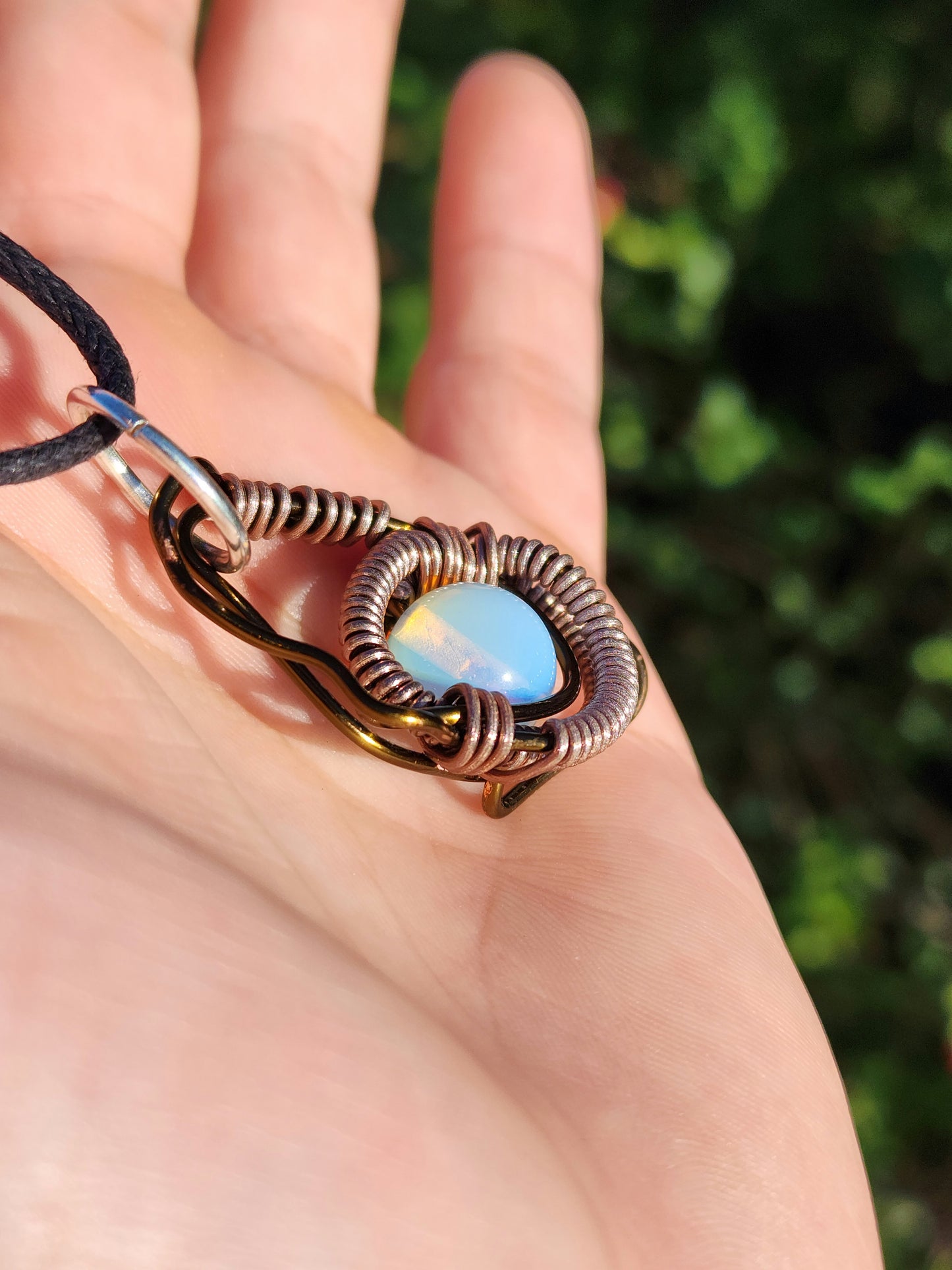 Eye of a Serpent. Opalite necklace. Made by Eyesthatburnthemind.