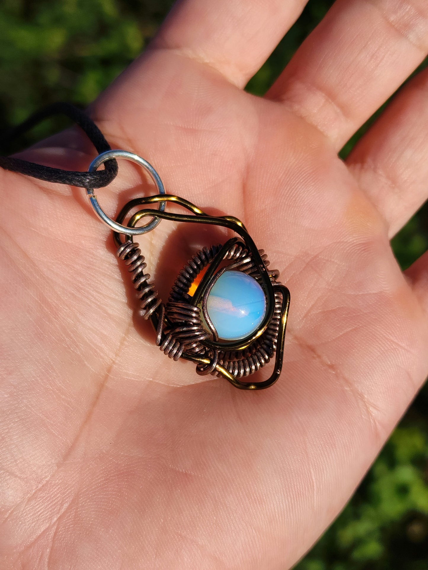 Eye of a Serpent. Opalite necklace. Made by Eyesthatburnthemind.