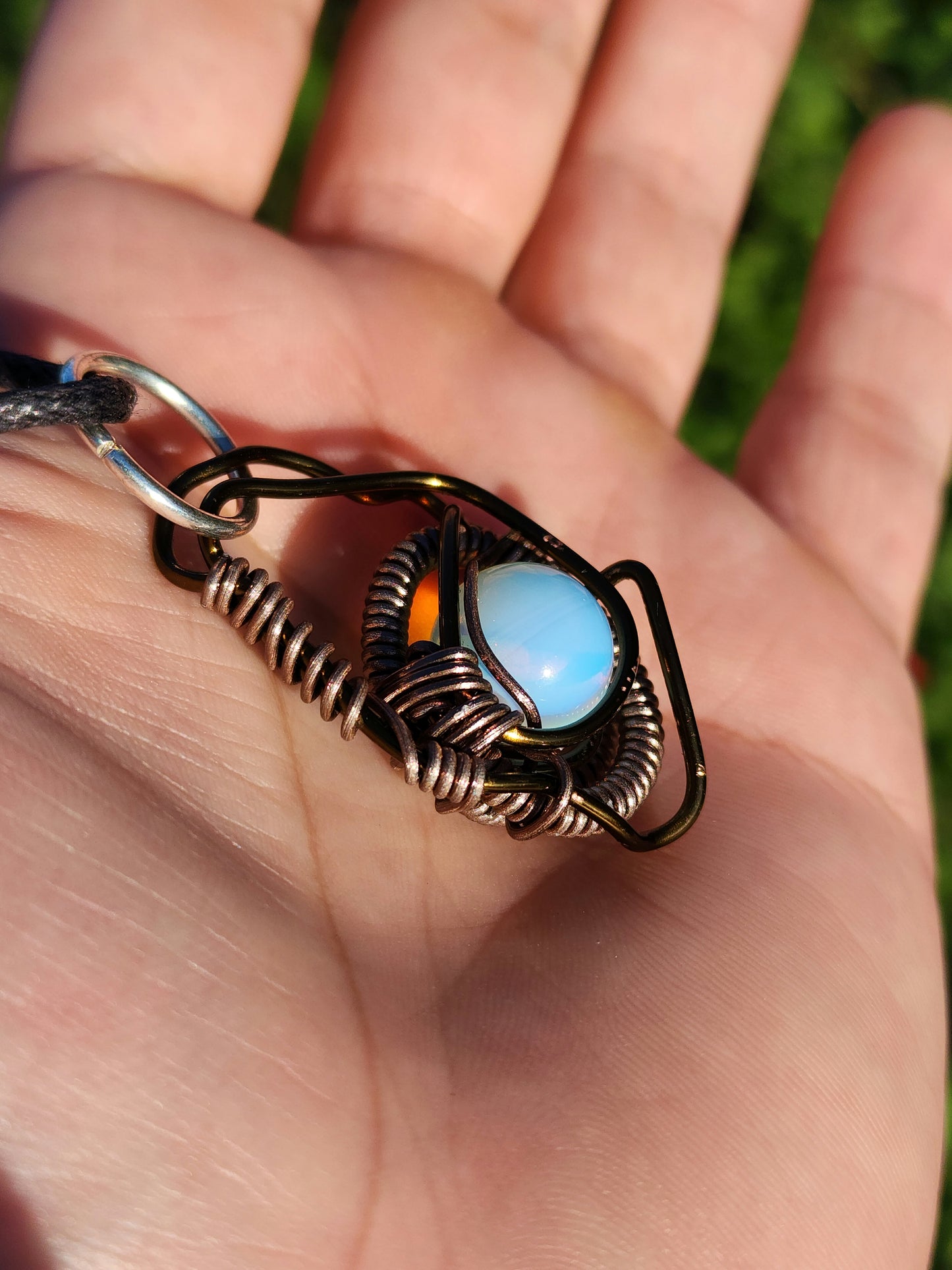 Eye of a Serpent. Opalite necklace. Made by Eyesthatburnthemind.